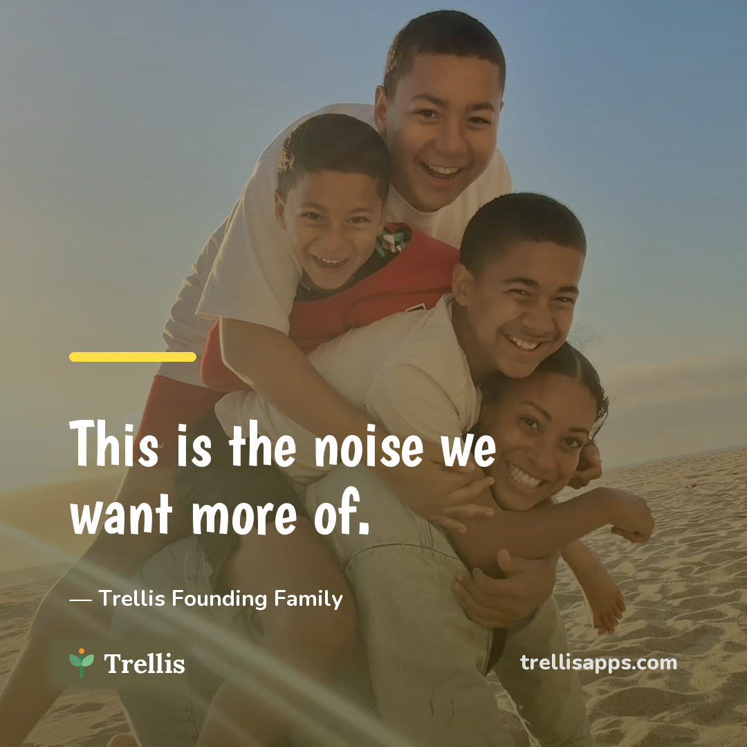 A mom and her three boys piled together at the beach — the noise we want more of