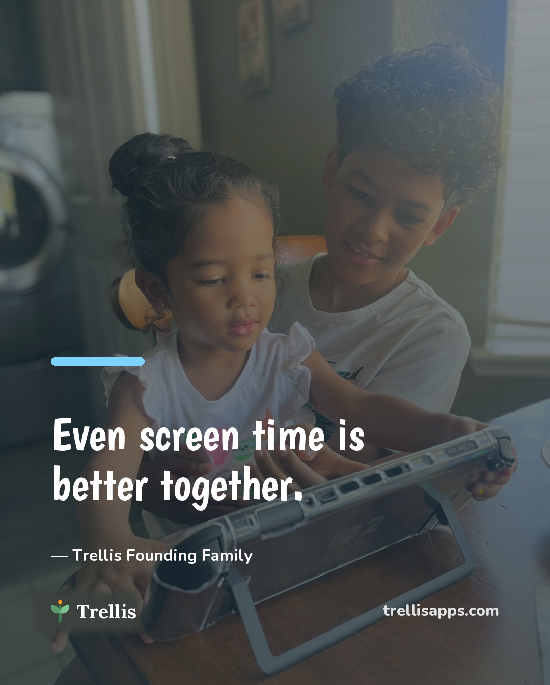 An older brother helping his little sister learn on a tablet — even screen time is better together